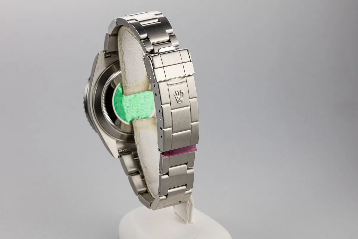 Mint 2003 Rolex Anniversary Green Submariner 16610LV with Box and Papers,Flat 4 Bezel, and Protective Stickers